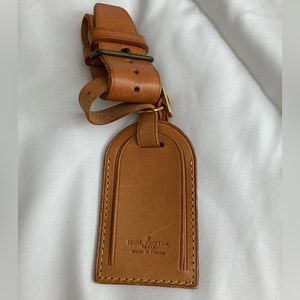 - LOUIS VUITTON LUGGAGE TAG WITH Poignet